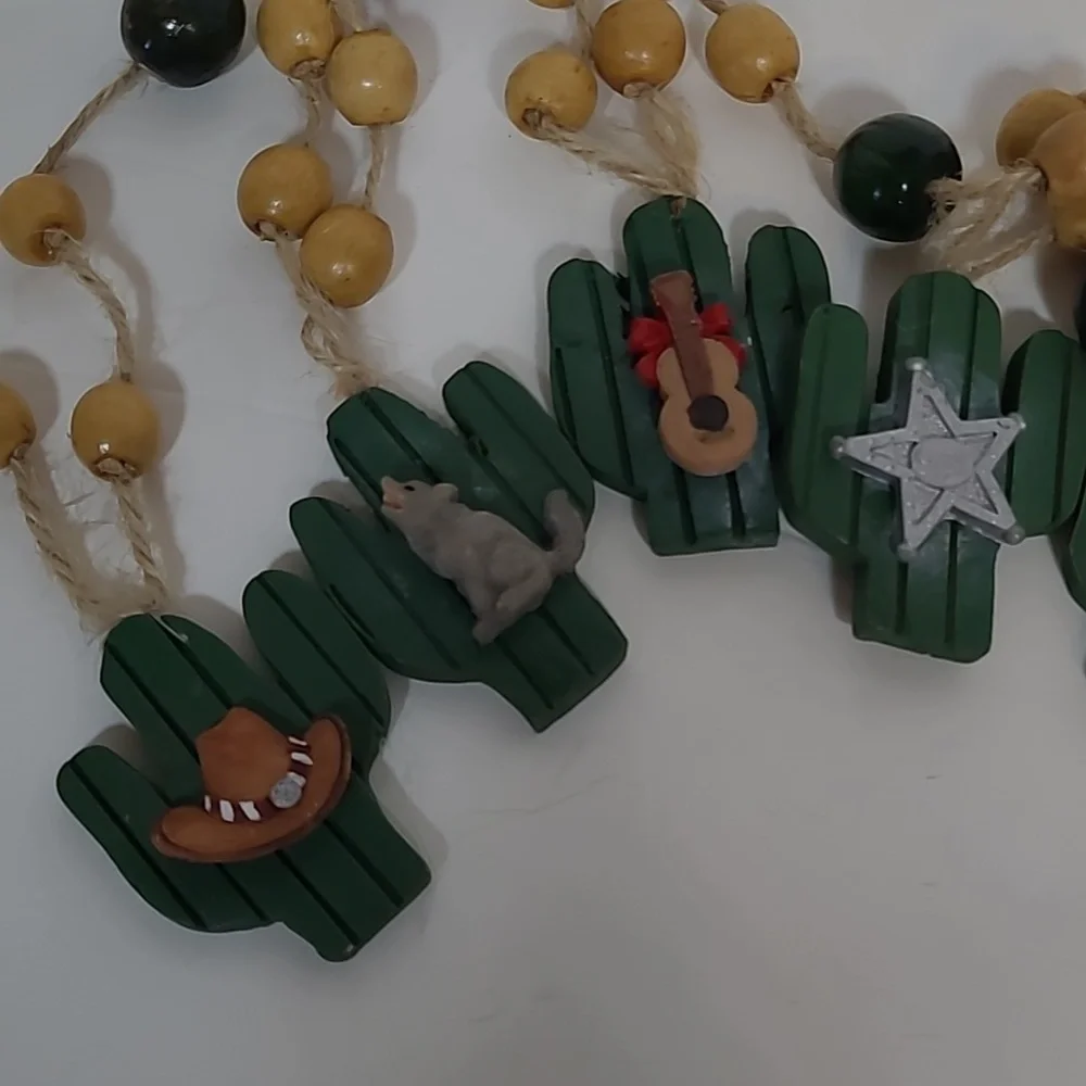 Vintage resin cactus western Christmas garland. Approximately 85 inches long